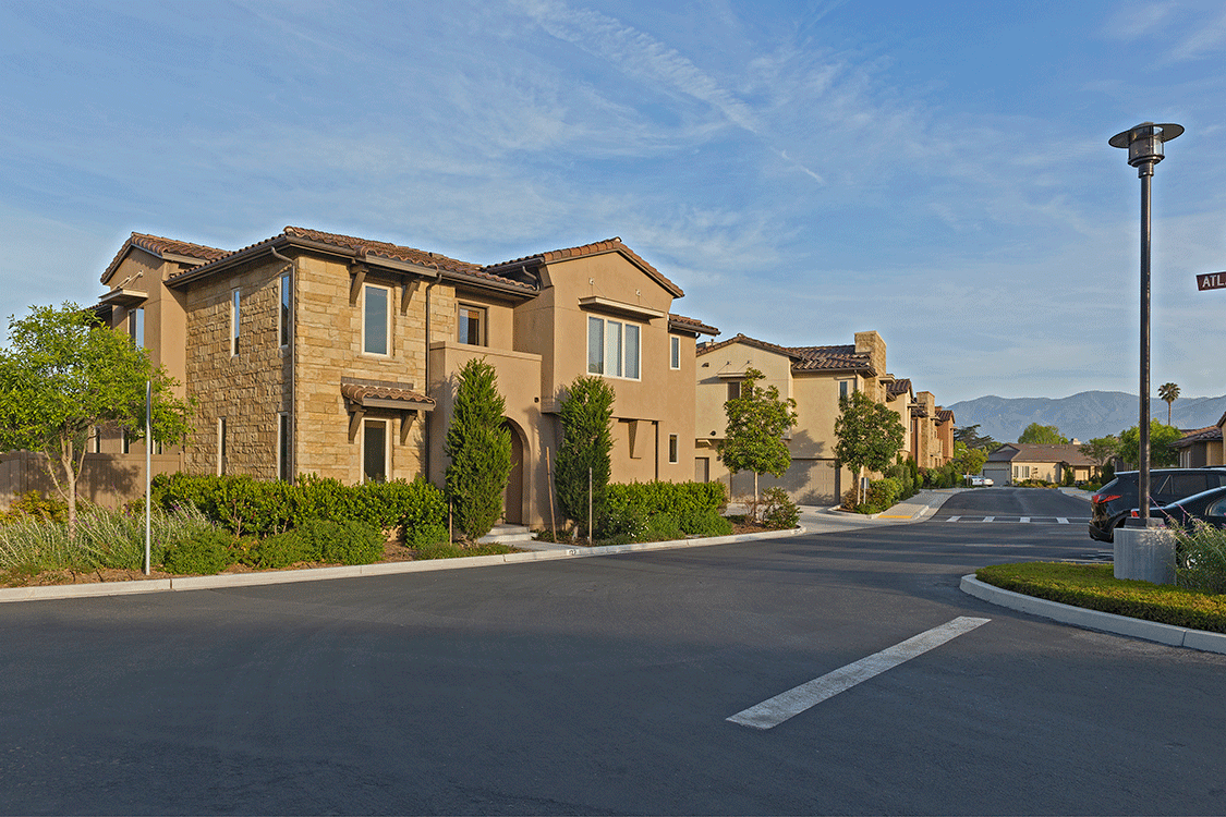 street view of two story tan colored homes