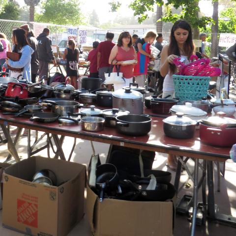Shoppers browse household items at last year’s GIVE! Sale